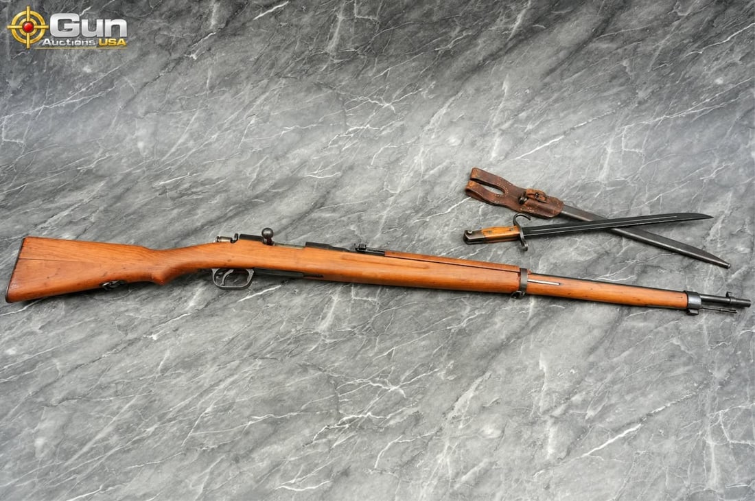GARDONE TYPE 1 6.5X50MM ITALIAN ARISAKA Rifle. Good condition, Normal Handling Marks. 31" Barrel.: GARDONE TYPE 1 6.5X50MM ITALIAN ARISAKA Rifle. Good condition, Normal Handling Marks. 31" Barrel. Shiny Bore, Tight Action Bolt Action . Features Straight Grained Wood Stock, Metal Butt Plate, Wood Fr