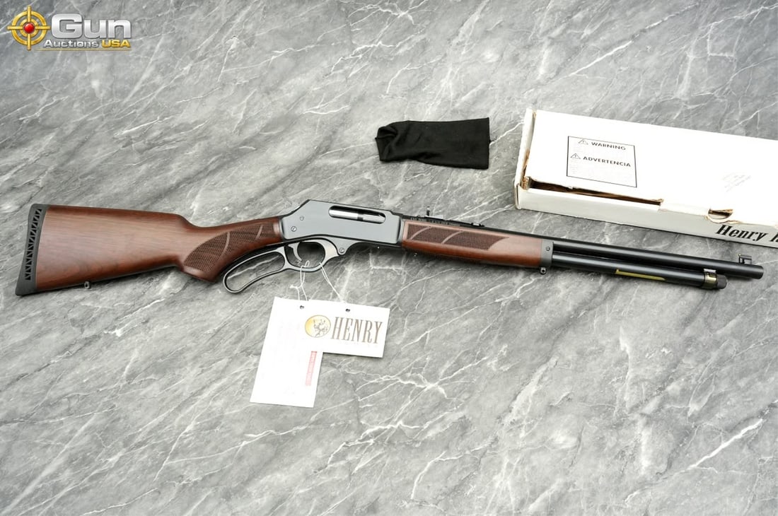 HENRY H018-410R .410 ga. Shotgun, sn:410HENRY149 Like NEW Lever-operated shotgun in .410 bore with: HENRY H018-410R .410 ga. Shotgun, sn:410HENRY149 Like NEW Lever-operated shotgun in .410 bore with American walnut stock and forend featuring textured panels for a secure hold. Dark matte finish on th