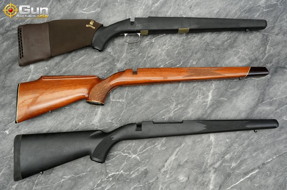 Collection of three various rifle stocks. Very Good Condition. Includes two black synthetic rifle (1 of 13)