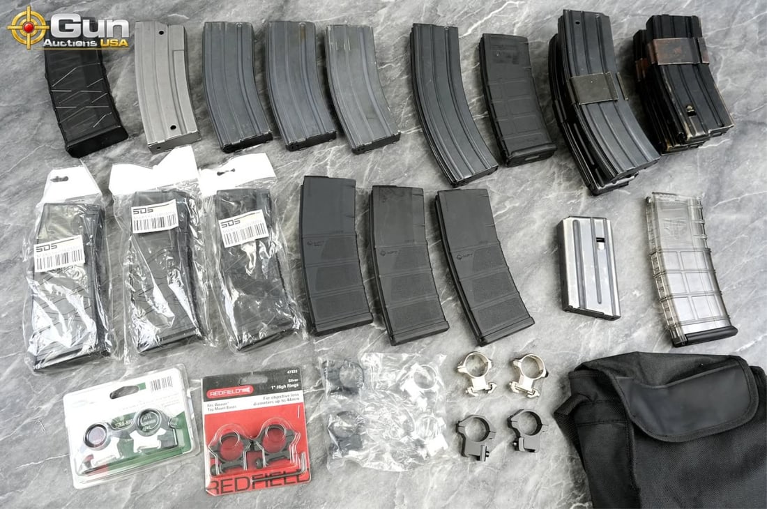 AR-15 rifle magazines and scope rings. Total of 19 magazines collection includes; 15 30 Round Mags, (1 of 20)