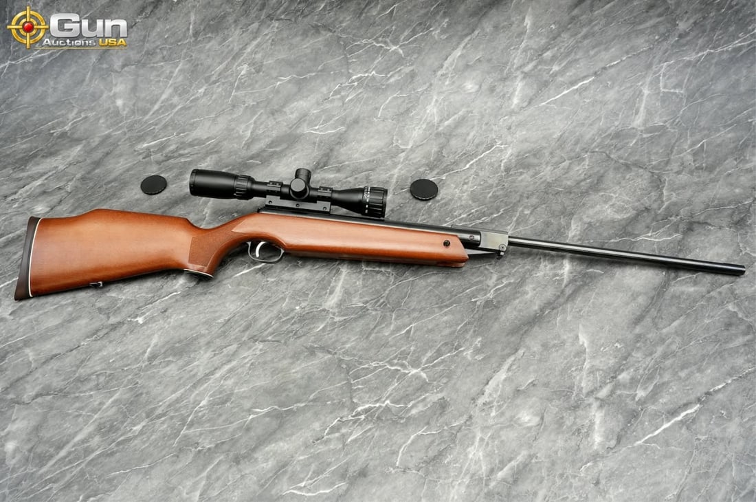 Feinwerkbau-Sport 124 .177 caliber air rifle. 18" barrel, Very Good Condition. Features a wooden (1 of 10)