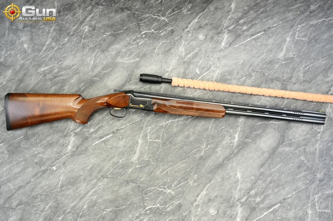 Browning GTI 12 ga. Over- Under Shotgun, 28" Barrel, Good Condition, Normal Handling Marks, Shiny: Browning GTI 12 ga. Over- Under Shotgun, 28" Barrel, Good Condition, Normal Handling Marks, Shiny Bore, Tight Action, sn:38077NYP13This over/under 12 gauge features the Invector-Plus choke system and 