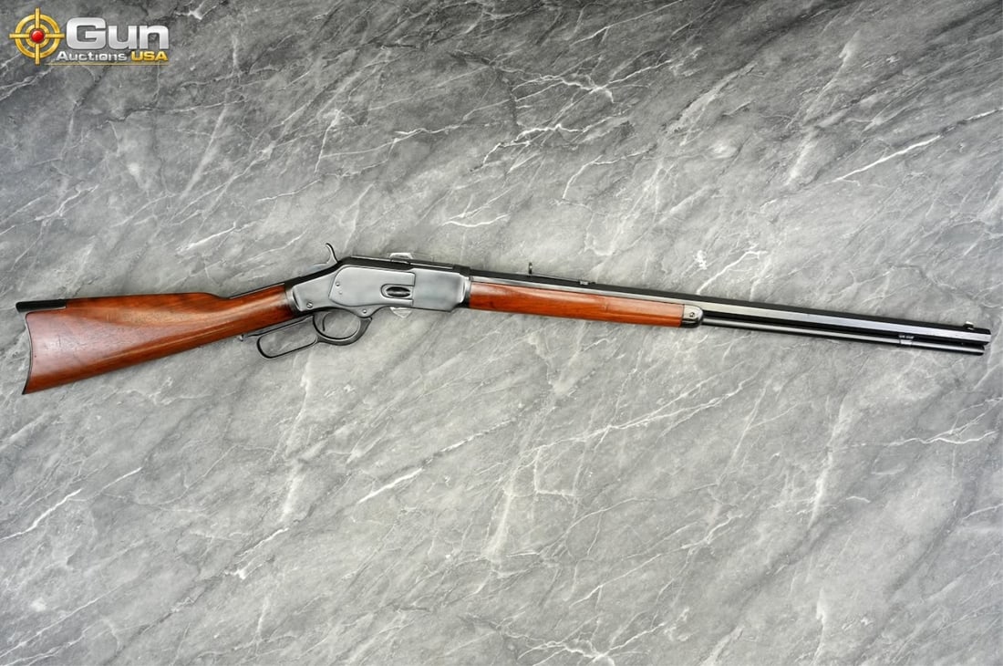 WINCHESTER 1873 .32 W.C.F. Lever Action Rifle, 24" Barrel, Very Good Condition, Shootable Bore,: WINCHESTER 1873 .32 W.C.F. Lever Action Rifle, 24" Barrel, Very Good Condition, Shootable Bore, Tight Action, sn:446232BThis classic lever-operated rifle chambered in .32 W.C.F. features a full-length