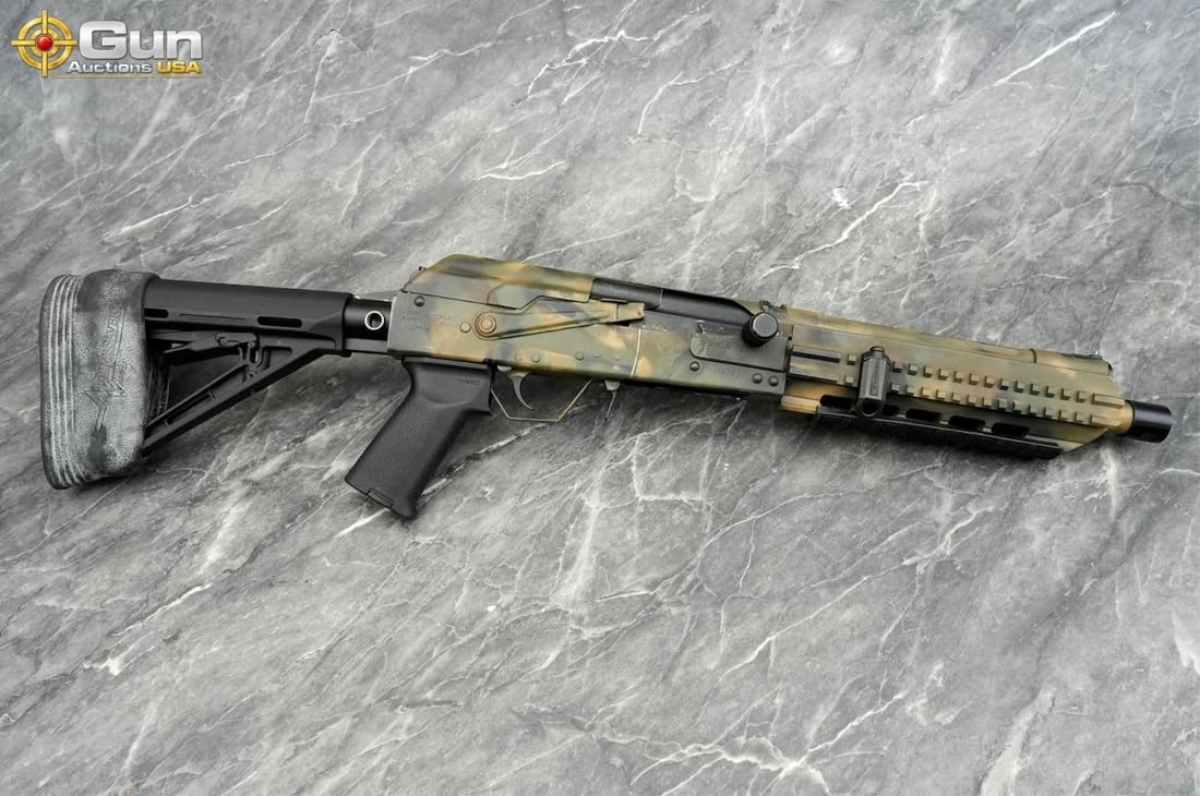 IZHMASH SAIGA-12 12 ga. SBS NFA/Short Barrel Shotgun. Good Condition, Normal Handling Marks. 10 3/4": IZHMASH SAIGA-12 12 ga. SBS NFA/Short Barrel Shotgun. Good Condition, Normal Handling Marks. 10 3/4" Barrel. Shiny Bore, Tight Action Semi Auto NFA ITEM, Features a THREADED BARREL with Thread Protect