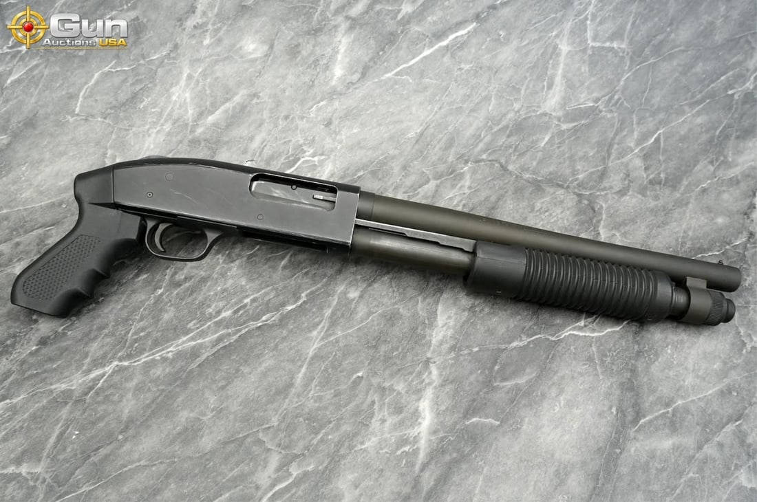NFA-AOW. MAVERICK Arms / Mossberg M590A1/51683 12GA Pump Action, 14" Barrel, Good Condition, Normal: NFA-AOW. MAVERICK Arms / Mossberg M590A1/51683 12GA Pump Action, 14" Barrel, Good Condition, Normal Handling Marks, Shiny Bore, Tight Action, sn:T353764This NFA-registered 12 gauge AOW features a comp