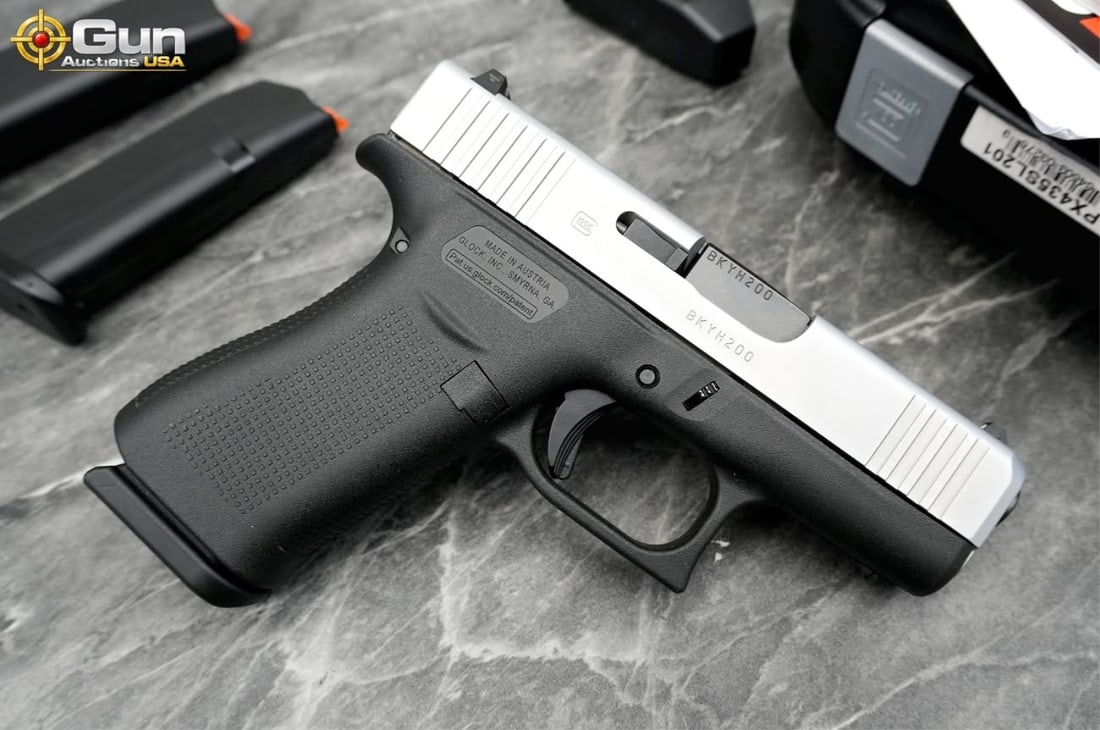 Glock 43X 9X19 Semi Auto Pistol, 3.25" Barrel, Excellent Condition, Shiny Bore, Tight Action,: Glock 43X 9X19 Semi Auto Pistol, 3.25" Barrel, Excellent Condition, Shiny Bore, Tight Action, sn:BKYH200This pistol has a two-tone configuration with a silver-finished slide over a black frame. It fea