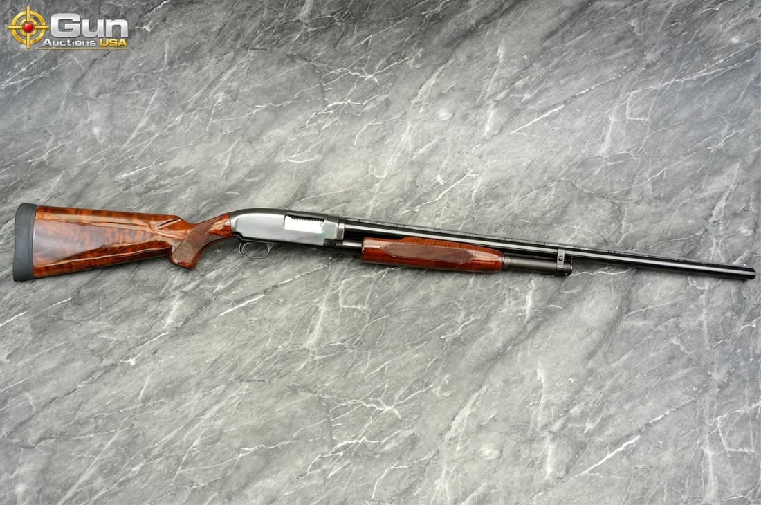WINCHESTER 12 12 GA. Pump Action Shotgun, 29" Barrel, Very Good Condition, Shiny Bore, Tight Action,: WINCHESTER 12 12 GA. Pump Action Shotgun, 29" Barrel, Very Good Condition, Shiny Bore, Tight Action, sn:319718This 12-gauge shotgun features a beautifully figured walnut stock and forend displaying st
