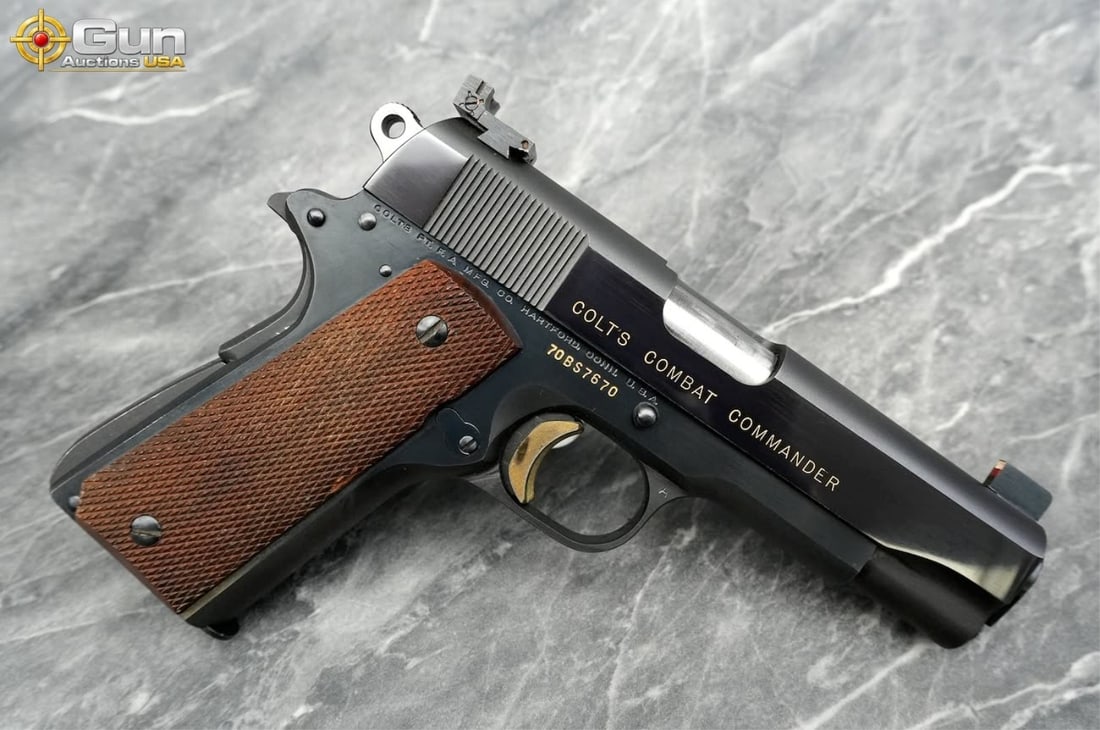 COLT COMBAT COMMANDER .45 AUTO COLLECTOR'S Pistol. Good Condition, Normal Handling Marks. 4.25": COLT COMBAT COMMANDER .45 AUTO COLLECTOR'S Pistol. Good Condition, Normal Handling Marks. 4.25" Barrel. Shiny Bore, Tight Action Semi Auto . Features a Custom Right Handed Wood Grip with Thumb Rest, G