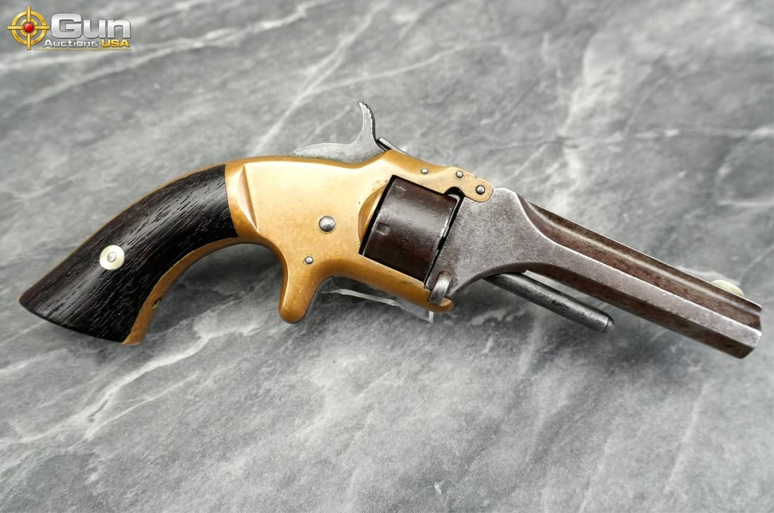 S&W MODEL 1 .22 Short Revolver, 3" Barrel, Good Condition, Normal Handling Marks, Dark Bore,: S&W MODEL 1 .22 Short Revolver, 3" Barrel, Good Condition, Normal Handling Marks, Dark Bore, sn:124785This tip-up, seven-shot revolver chambered in .22 Short dates to the post-Civil War era, when smal