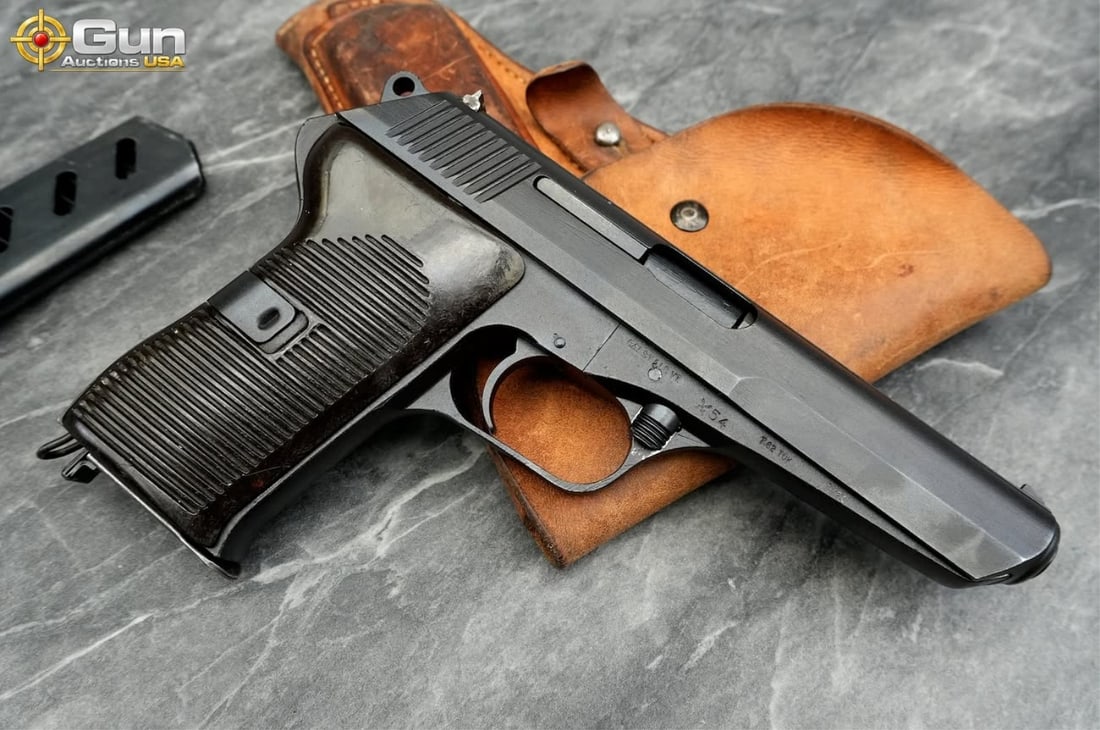 CZECH 52 7.62 TOK Semi Auto Pistol, 5" Barrel, Very Good Condition, Shiny Bore, Tight Action,: CZECH 52 7.62 TOK Semi Auto Pistol, 5" Barrel, Very Good Condition, Shiny Bore, Tight Action, sn:LB2273Czechoslovakian military sidearm chambered in 7.62x25mm Tokarev, featuring a dark-finished slide 