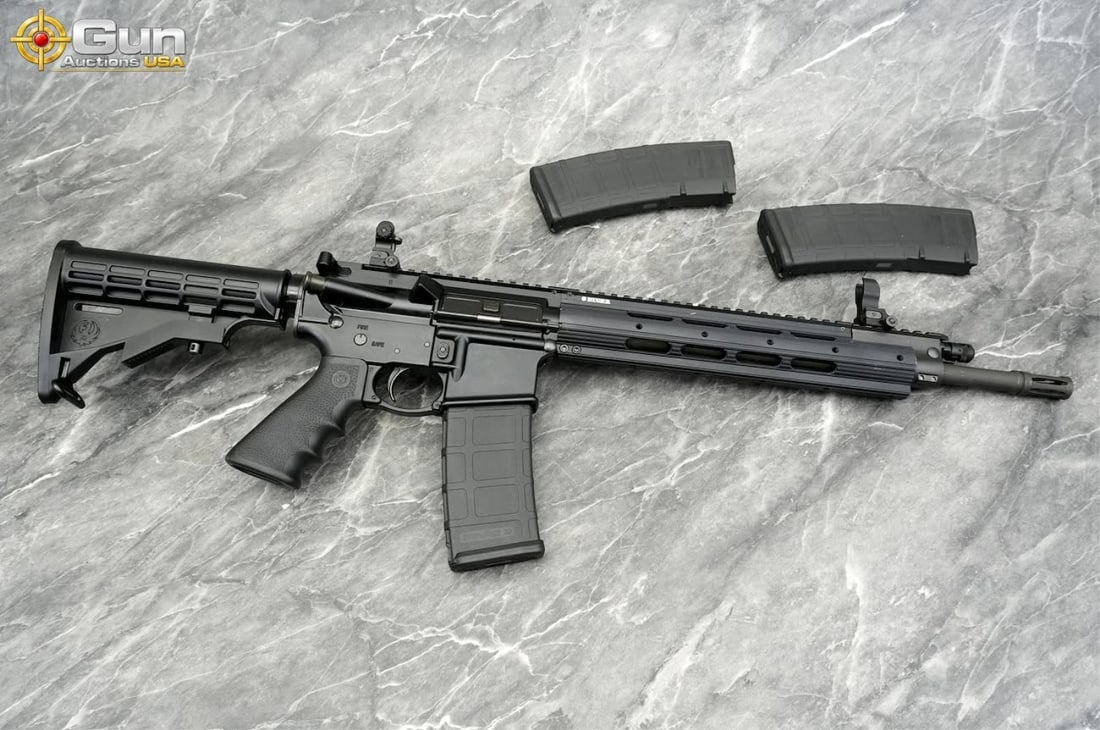 Ruger SR-556 5.56 MM THREADED BARREL Semi Auto Rifle, 16 5/8" Barrel, Excellent Condition, Shiny: Ruger SR-556 5.56 MM THREADED BARREL Semi Auto Rifle, 16 5/8" Barrel, Excellent Condition, Shiny Bore, Tight Action, sn:591-22955Modern sporting rifle featuring a threaded barrel with flash hider, fre
