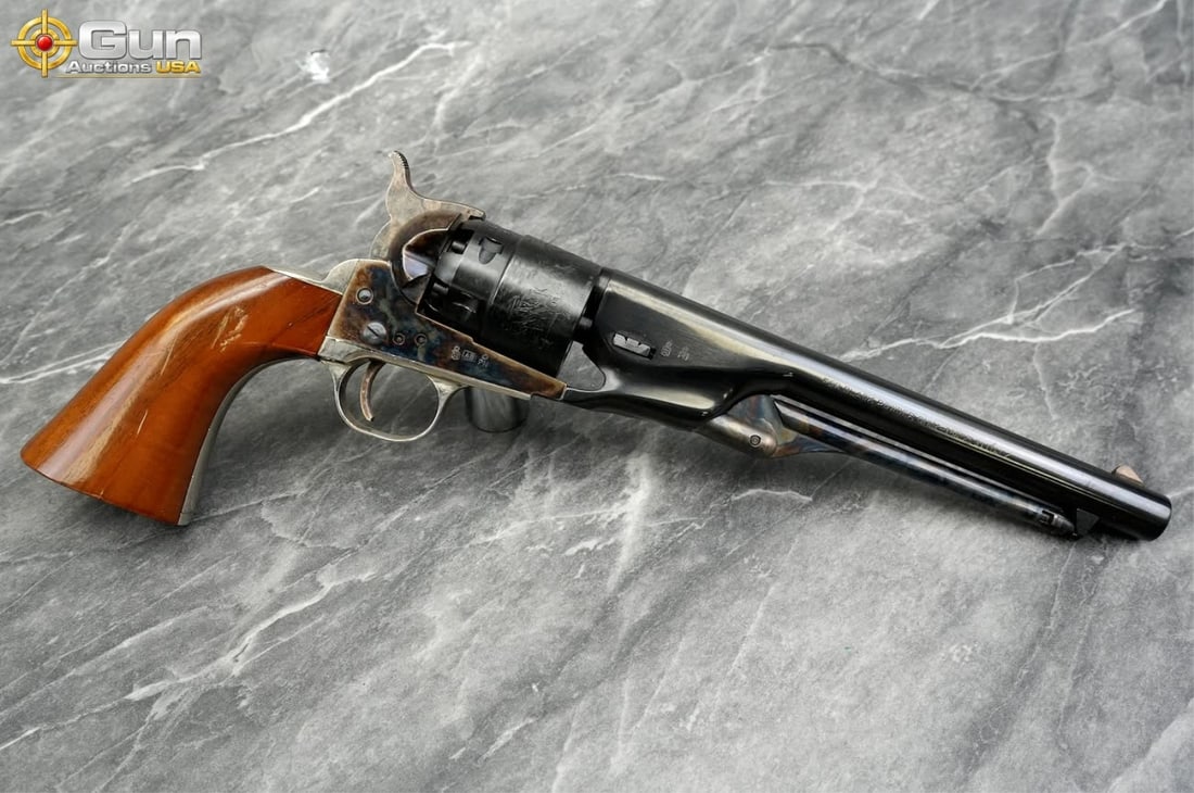 Pietta Model 1860 Army Replica Revolver, 7.75" Barrel, Very Good Condition This .44 caliber black: Pietta Model 1860 Army Replica Revolver, 7.75" Barrel, Very Good ConditionThis .44 caliber black powder percussion revolver features blued barrel, engraved cylinder, case-hardened frame, hammer, and l