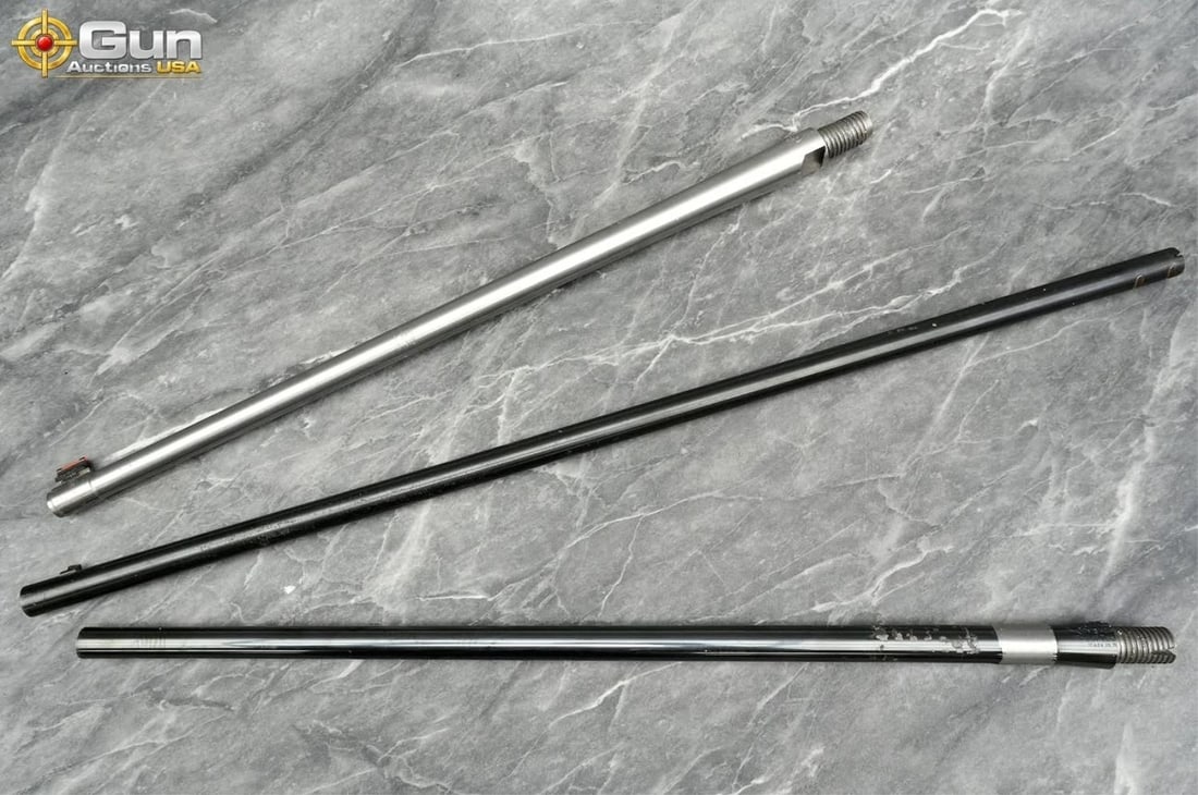 Pro-Shot barrel and barrel blanks assembly. Very Good Condition. This group features a Pro-Shot: Pro-Shot barrel and barrel blanks assembly. Very Good Condition. This group features a Pro-Shot 1-piece stainless steel barrel with patch holder (36" length, .27 cal & up) alongside uninstalled rifle 