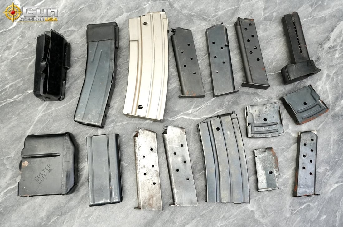Assorted magazines, Fair Condition This assortment includes metal magazines in various calibers and (1 of 14)