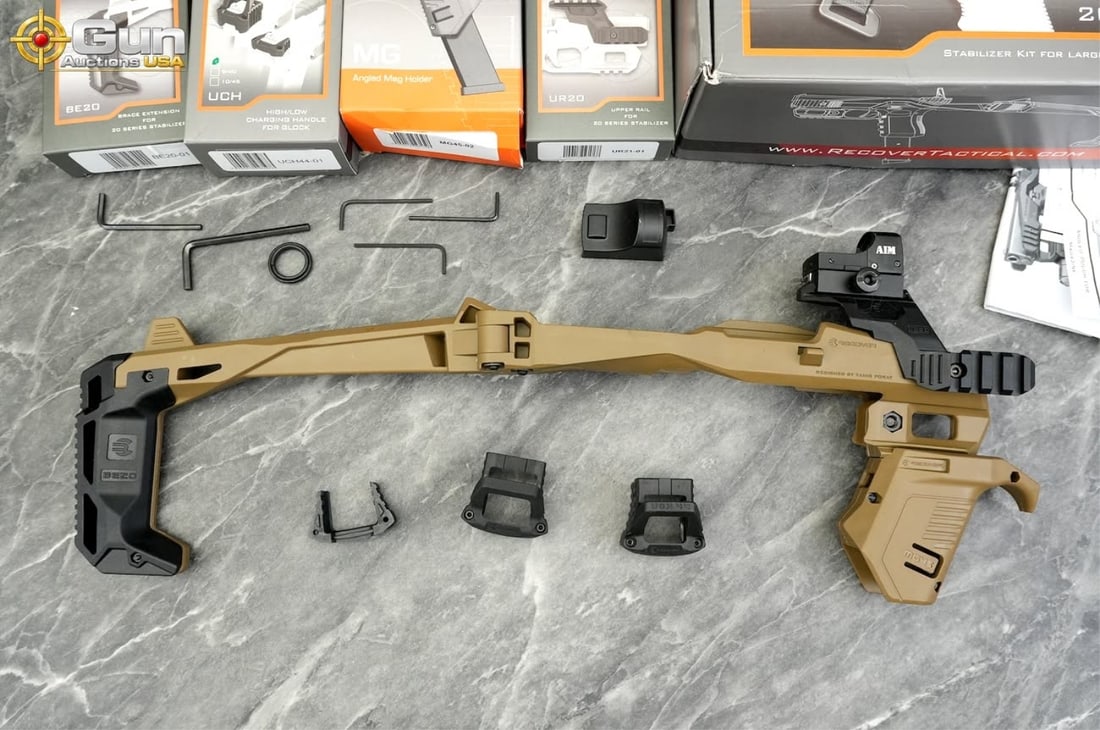 Recover Tactical 20/21 Stabilizer Kit Setup, Excellent Condition Features a tan polymer folding: Recover Tactical 20/21 Stabilizer Kit Setup, Excellent ConditionFeatures a tan polymer folding stabilizer frame with BE20 buttstock extension, MG45 angled magazine pouch grip, upper/side UR20 Picatinn
