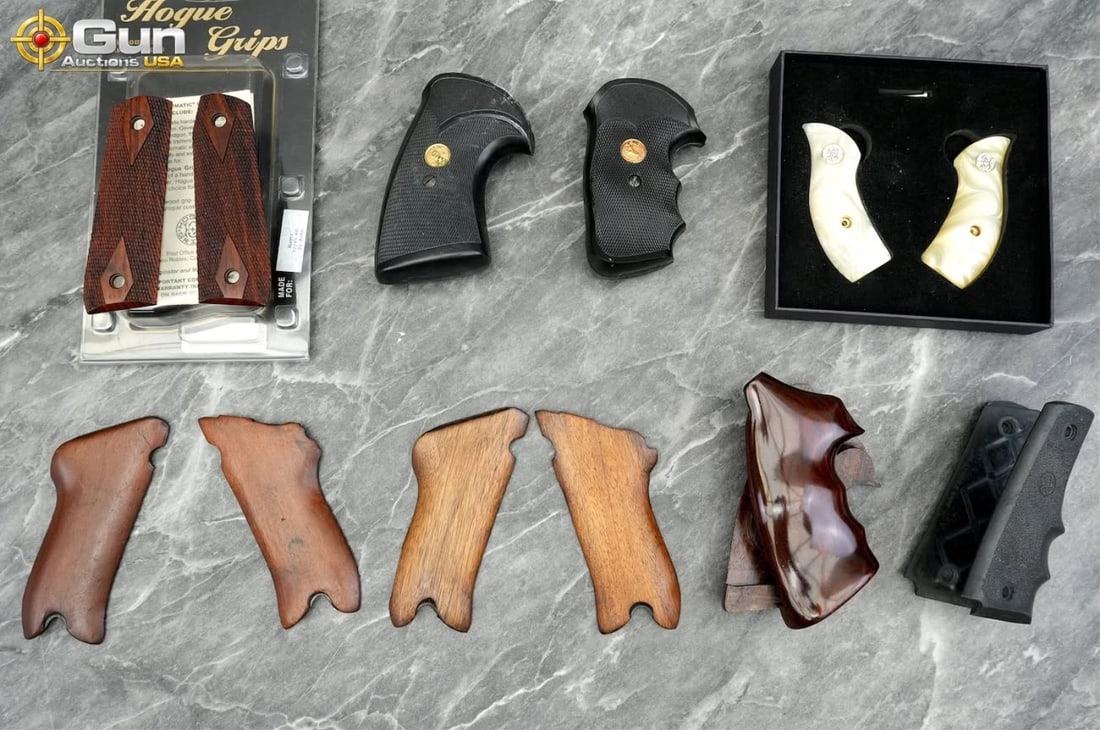 Hogue and Pachmayr, etc. grips, Very Good Condition Includes Hogue checkered hardwood grips for the: Hogue and Pachmayr, etc. grips, Very Good ConditionIncludes Hogue checkered hardwood grips for the Ruger 22/45 RP, faux pearl grips with S&W medallions and box, smooth wood revolver grips, and Pachmay