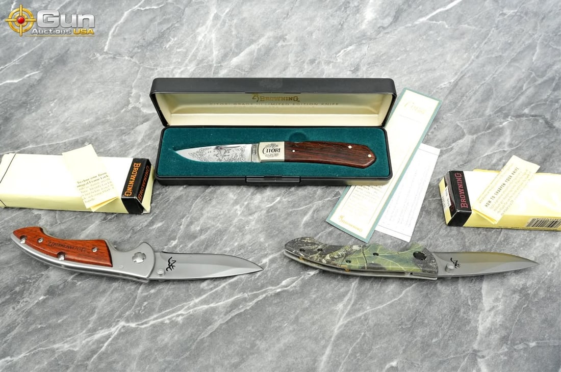 Three assorted Browning folding pocket knives shown, Excellent Condition This group features a: Three assorted Browning folding pocket knives shown, Excellent ConditionThis group features a Browning Citori Grade III limited edition 1-of-3000 folding knife with an etched blade in a velvet-lined d