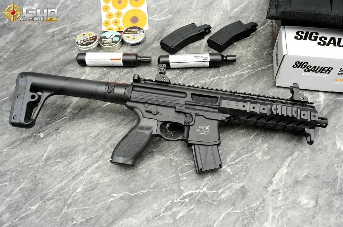 Sig Sauer MPX .177 air rifle with pellets, Very Good Condition A Japanese-made CO2-powered air rifle: Sig Sauer MPX .177 air rifle with pellets, Very Good ConditionA Japanese-made CO2-powered air rifle chambered in .177 caliber (4.5mm). Includes two tins of Sig Sauer Crux Ballistic Alloy pellets, one 