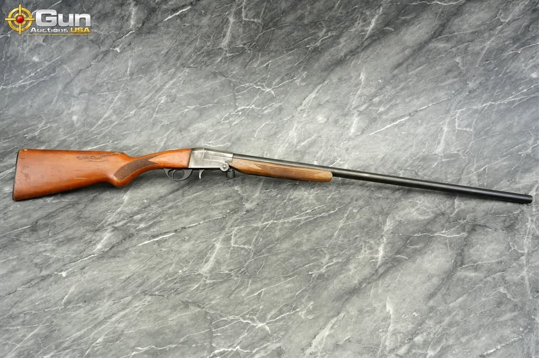 INVESTARM 70 12 GA. Single Shot Shotgun, 31 5/8" Barrel, Good Condition, Normal Handling Marks,: INVESTARM 70 12 GA. Single Shot Shotgun, 31 5/8" Barrel, Good Condition, Normal Handling Marks, Shiny Bore, Tight Action, sn:211727Italian-made single-shot shotgun in 12 gauge featuring a hardwood sto