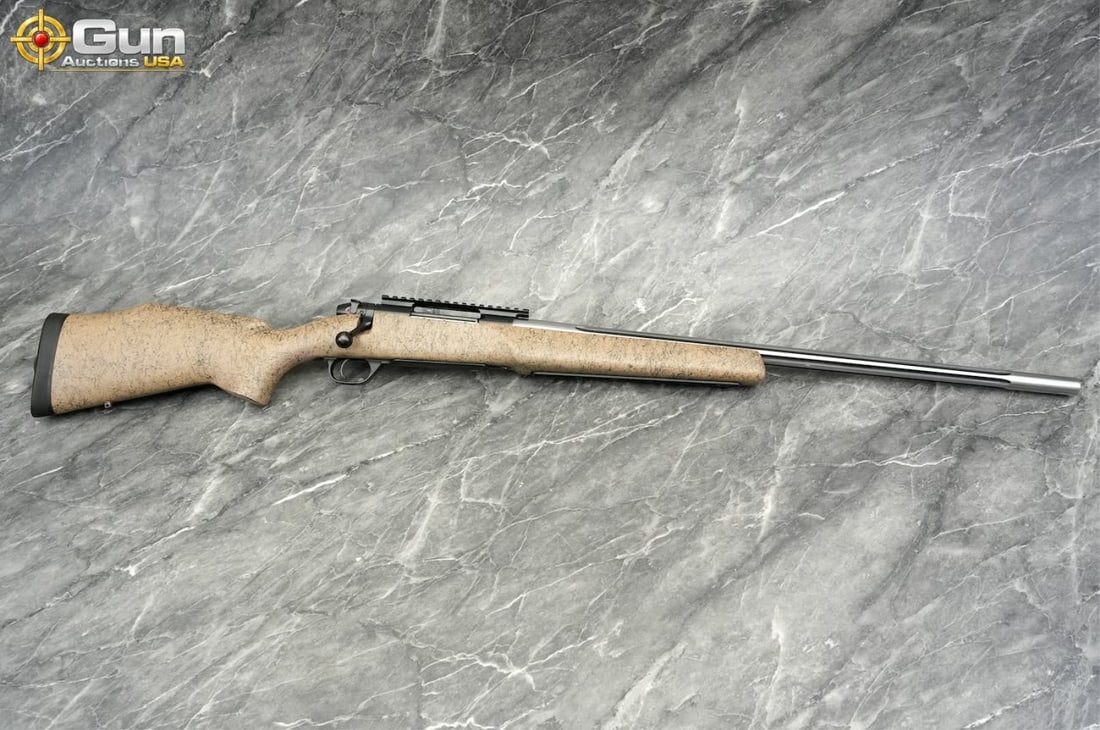 Weatherby MARK V .243 WIN Bolt Action Rifle, 26" Barrel, Very Good Condition, Shiny Bore, Tight: Weatherby MARK V .243 WIN Bolt Action Rifle, 26" Barrel, Very Good Condition, Shiny Bore, Tight Action, sn:WB016299 This American-made rifle in .243 Winchester features a fluted stainless barrel paire