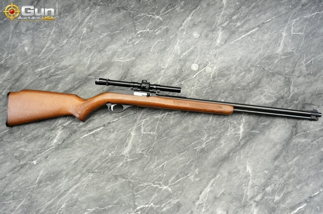 MARLIN GLENFIELD MODEL 60 .22 LR Semi Auto Rifle, 21.5" Barrel, Good Condition, Normal Handling: MARLIN GLENFIELD MODEL 60 .22 LR Semi Auto Rifle, 21.5" Barrel, Good Condition, Normal Handling Marks, Shiny Bore, Tight Action, sn:27327573 This .22 LR rifle features a hardwood stock with texturing 