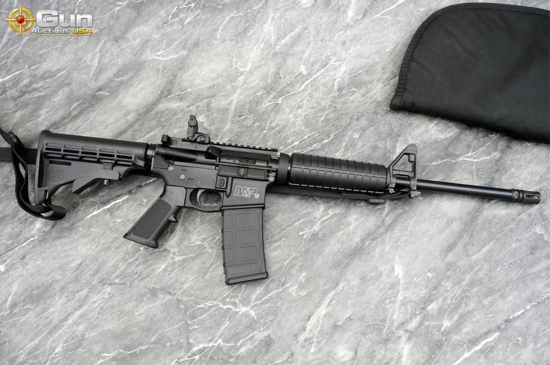 S&W M&P 15 5.56 NATO THREADED BARREL Semi Auto Rifle, 17.25" Barrel, Very Good Condition, Shiny: S&W M&P 15 5.56 NATO THREADED BARREL Semi Auto Rifle, 17.25" Barrel, Very Good Condition, Shiny Bore, Tight Action, sn:TJ42819 This rifle features a threaded barrel with flash hider, matte black finis