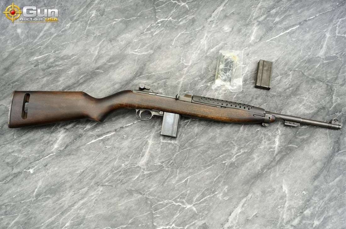 NATIONAL POSTAL METER M1 CARBINE .30: NATIONAL POSTAL METER US M1 CARBINE .30 Cal. Semi Auto Rifle, 18" Barrel, Very Good Condition, Shiny Bore, Tight Action, sn:4428570This World War II-era M1 Carbine features a dark walnut stock paired 