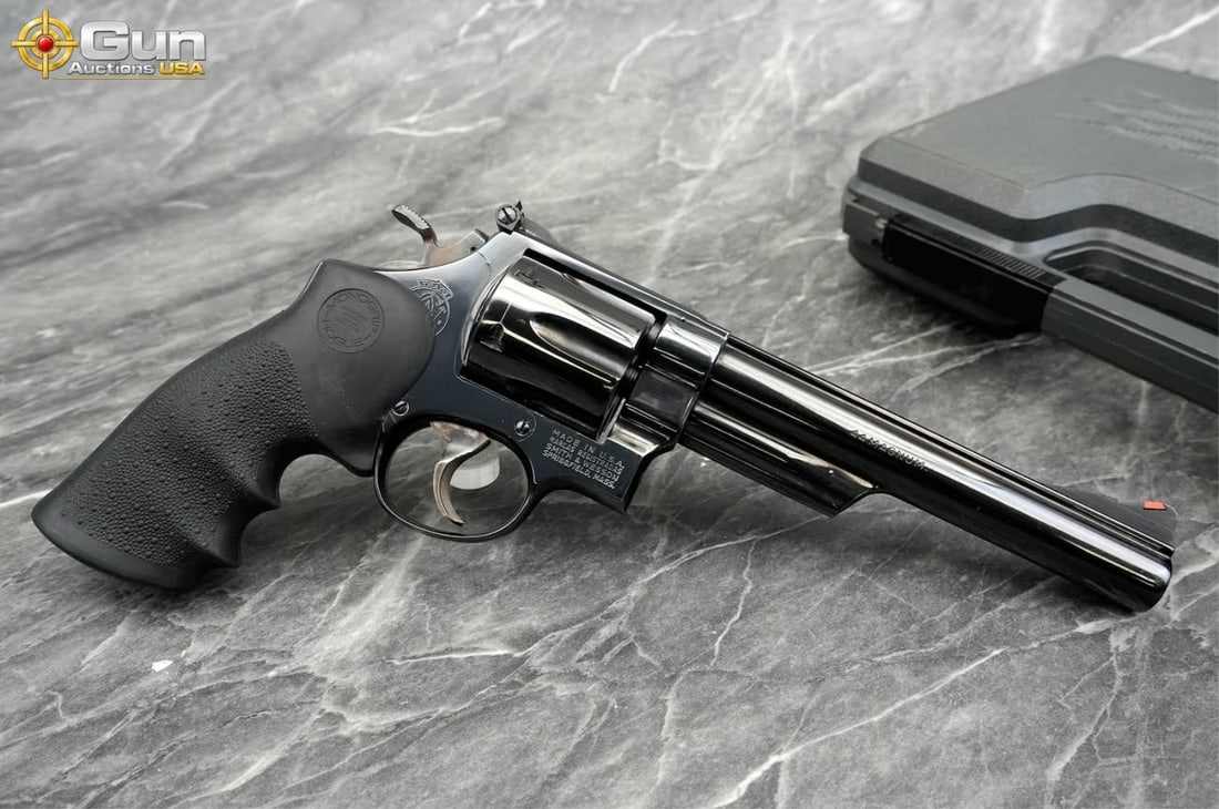 S&W 29-2 .44 MAG REVOLVER: S&W 29-2 .44 MAGNUM Revolver, 6 3//8" Barrel, Excellent Condition, Shiny Bore, Tight Action, sn:N138604This S&W Model 29-2 N-frame revolver in .44 Magnum showcases a deep, lustrous blued finish throug