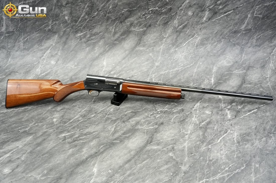 BROWNING LIGHT TWENTY 20GA SEMI SHOTGUN: Browning AUTO LIGHT TWENTY 20 ga. Semi Auto Shotgun, 27.5" Barrel, Excellent Condition, Shiny Bore, Tight Action, sn:18232NM231. This 20-gauge semi-automatic sporting shotgun displays the squared