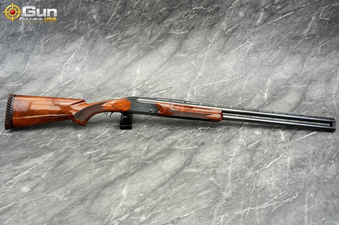 REMINGTON 3200 TRAP 12GA O/U SHOTGUN: REMINGTON 3200 SPECIAL TRAP 12 GA. Over-Under Shotgun, 30" Barrel, Excellent Condition, Shiny Bore, Tight Action, sn:OU10108This handsome Remington Model 3200 "Special Trap" over/under 12-gauge