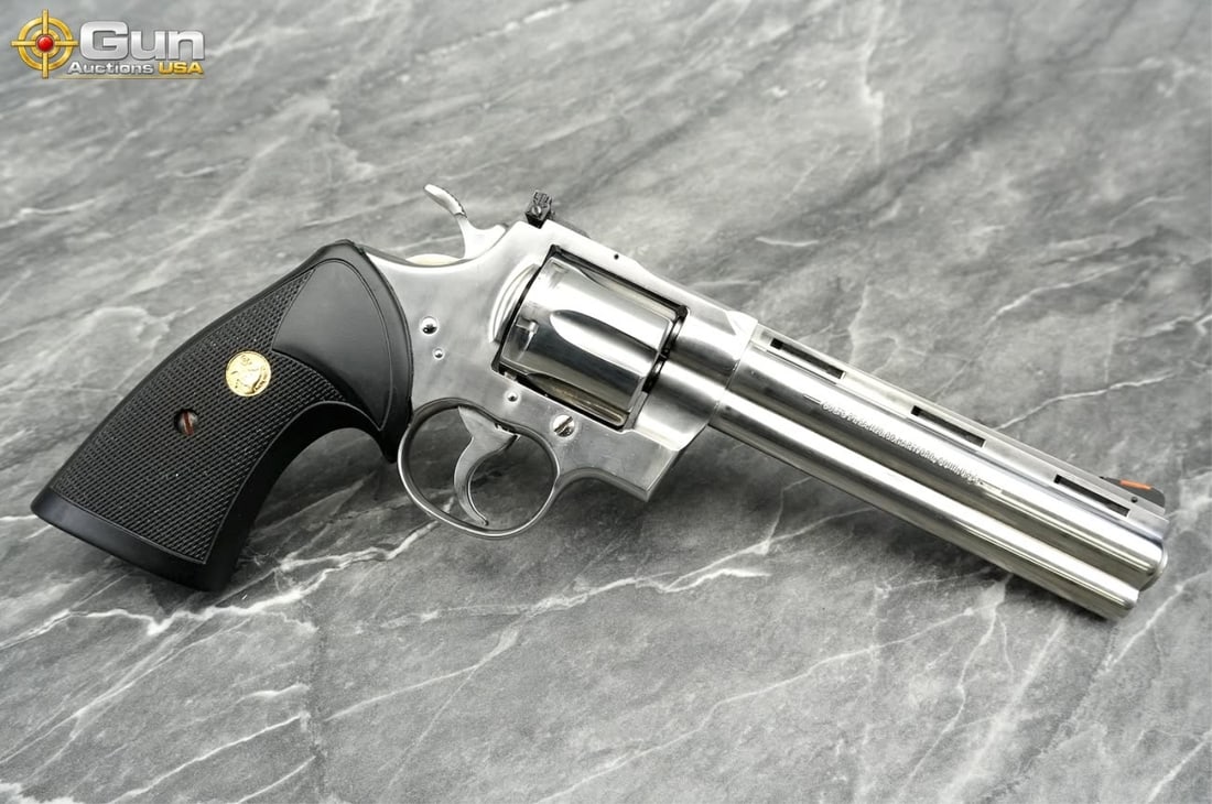 COLT PYTHON .357 MAG REVOLVER 6in: COLT PYTHON .357 MAGNUM SNAKE GUN Revolver, 6" Barrel, Excellent Condition, Shiny Bore, Tight Action, sn:T95231This stunning Python wears a bright polished stainless finish throughout, with a