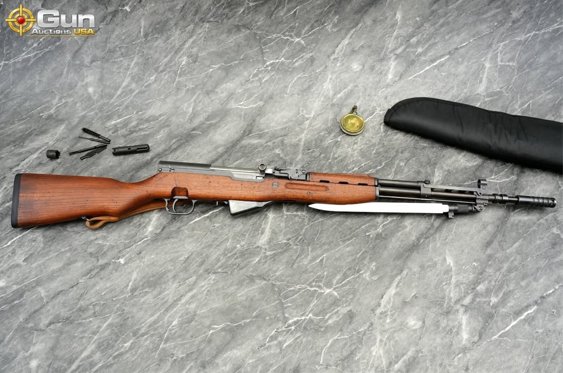 ZASTAVA M59/66 7.62X39 SKS SEMI RIFLE: Zastava Arms M59/66 7.62 x 39 Semi Auto Rifle, 21.5" Barrel, Very Good Condition, Shiny Bore, Tight Action, sn:D-79180This Zastava Arms M59/66 is a Yugoslavian SKS variant chambered in 7.62x39mm, dist