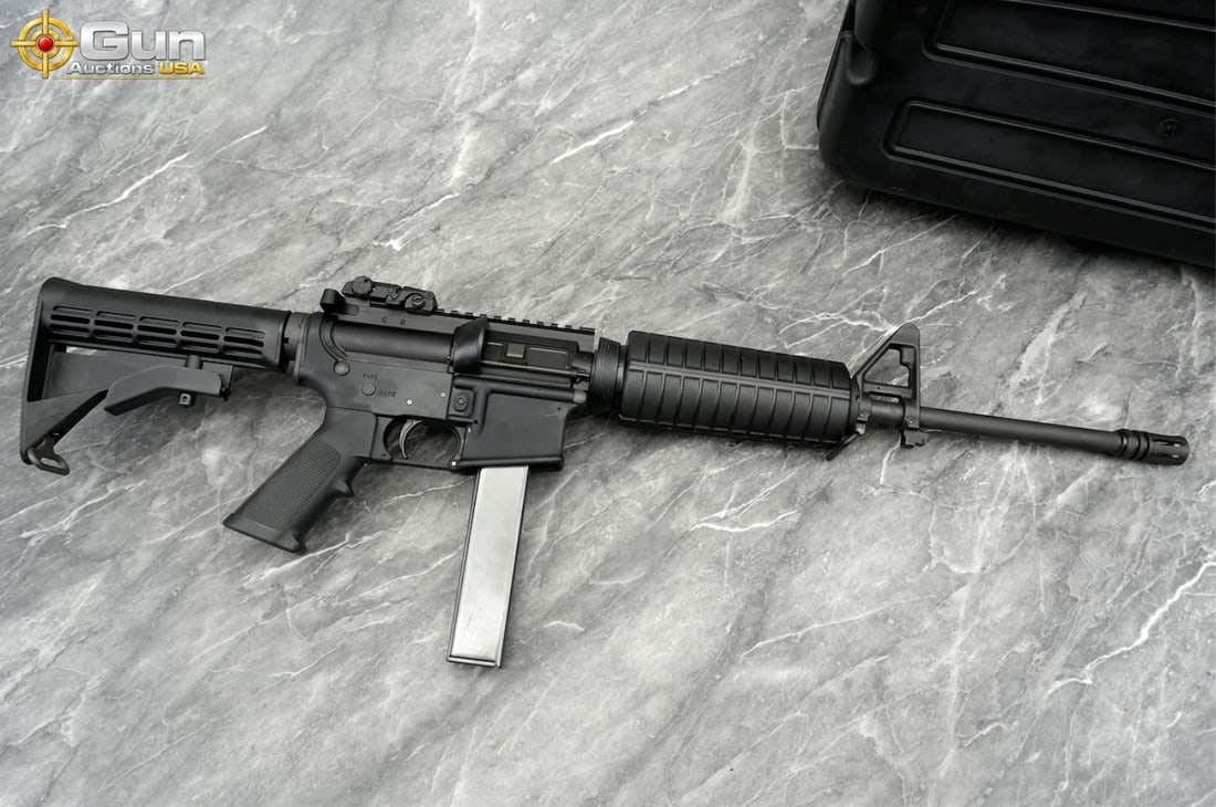 COLT AR-15 9MM SEMI RIFLE THREADED: COLT DEFENSE AR-15 9mm THREADED BARREL Semi Auto Rifle, 16.25" Barrel, Excellent Condition, Shiny Bore, Tight Action, sn:LTA015702This Colt Defense AR-15 is a 9mm semi-automatic carbine with a 16.25" 