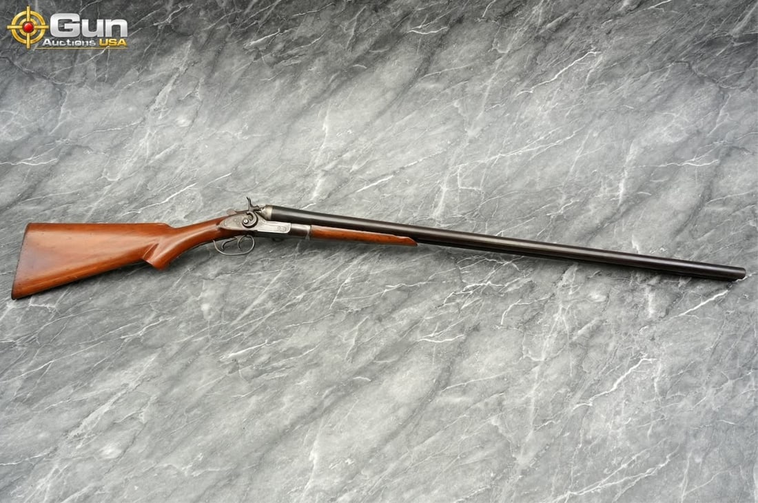 DIAMOND ARMS 12GA SxS HAMMER SHOTGUN: DIAMOND ARMS CO. THE INTERCHANGEABLE 12 ga. SXS Shotgun, 32" Barrel, Good Condition, Normal Handling Marks, Shootable Bores, Tight Action, sn:2486A classic exposed-hammer double-barrel shotgun in 12 g