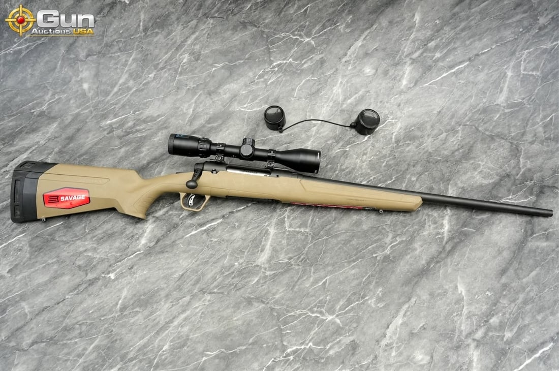 SAVAGE AXIS 6.5 CREEDMOOR BOLT RIFLE: SAVAGE AXIS 6.5 CREEDMOOR Bolt Action Rifle, 22" Barrel, Very Good Condition, Shiny Bore, Tight Action, sn:PT06672This rifle features a Flat Dark Earth synthetic stock paired with a matte black