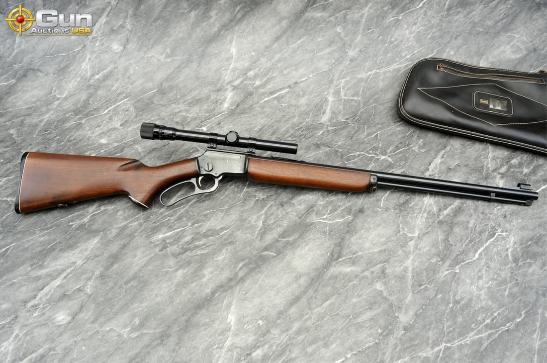 MARLIN 39A .22 LR LEVER ACTION RIFLE: MARLIN 39A .22 S-L-LR Lever Action Rifle, 23.25" Barrel, Very Good Condition, Shiny Bore, Tight Action, sn:P29975This rimfire rifle features a walnut pistol-grip stock and forend, with the receiver di
