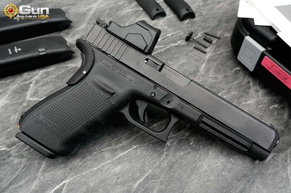 GLOCK 41 GEN 4 .45 AUTO SEMI PISTOL: GLOCK 41 GEN 4 .45 AUTO Semi Auto Pistol, 5.25" Barrel, Good Condition, Normal Handling Marks, Shiny Bore, Tight Action, sn:ALKF179This Glock 41 Gen 4, chambered in .45 Auto, wears a uniform matte bla