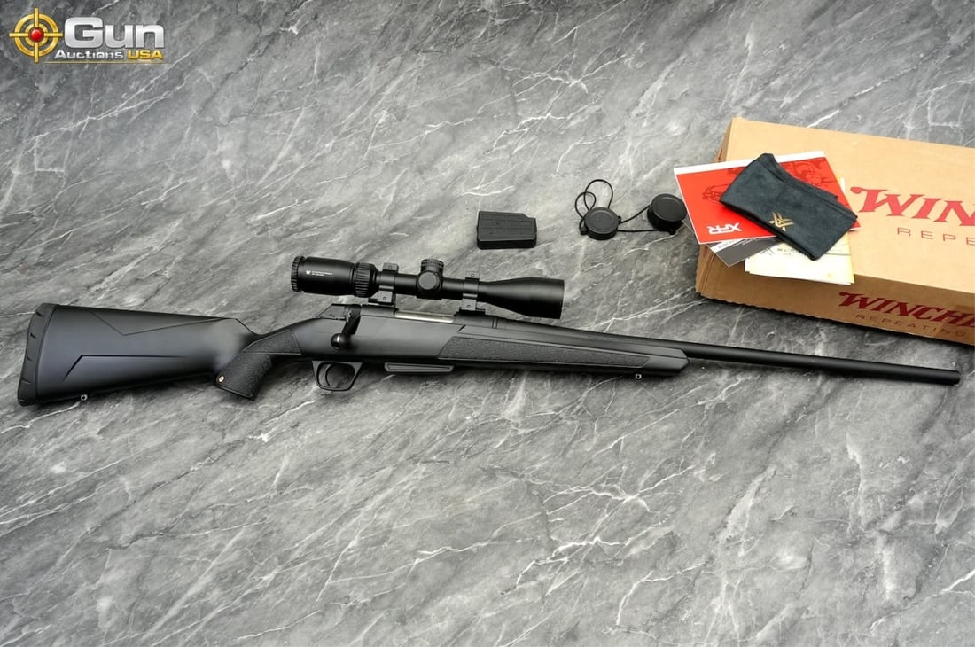 WINCHESTER XPR 6.5CM BOLT ACTION RIFLE: Winchester XPR 6.5CM Bolt Action Rifle, 22" Barrel, Like NEW, sn:357ZP05398This Winchester XPR, chambered in 6.5 Creedmoor, wears a matte black synthetic stock with textured gripping panels at the for