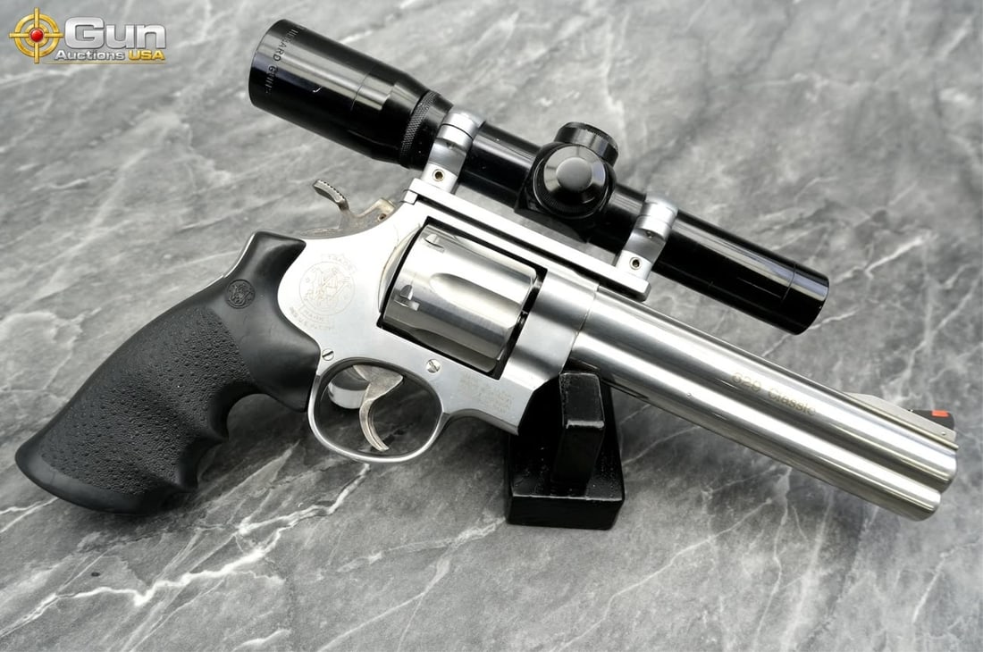 S&W 629-4 .44 MAGNUM Revolver, 6.5" Barrel: S&W 629-4 .44 MAGNUM Revolver, 6.5" Barrel, Very Good Condition, Shiny Bore, Tight Action, sn:BSH6116 This stainless N-frame revolver in .44 Magnum features a full underlug barrel with a red fiber
