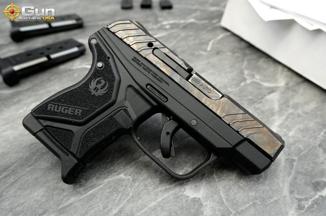 RUGER LCP II .380 SEMI PISTOL: Ruger LCP II .380 AUTO Semi Auto Pistol, 2.75" Barrel, Excellent Condition, Shiny Bore, Tight Action, sn:380679539This sub-compact pocket pistol is chambered in .380 Auto and features a distinctive