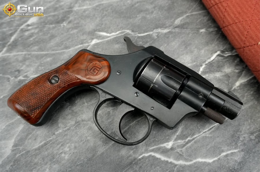 RG 23 .22 LR REVOLVER: RG IND RG 23 .22 LR Revolver, 1.75" Barrel, Very Good Condition, Shiny Bore, Tight Action, sn:T755284This snub-nose revolver is chambered in .22 LR and wears a dark blued finish. It features checkered