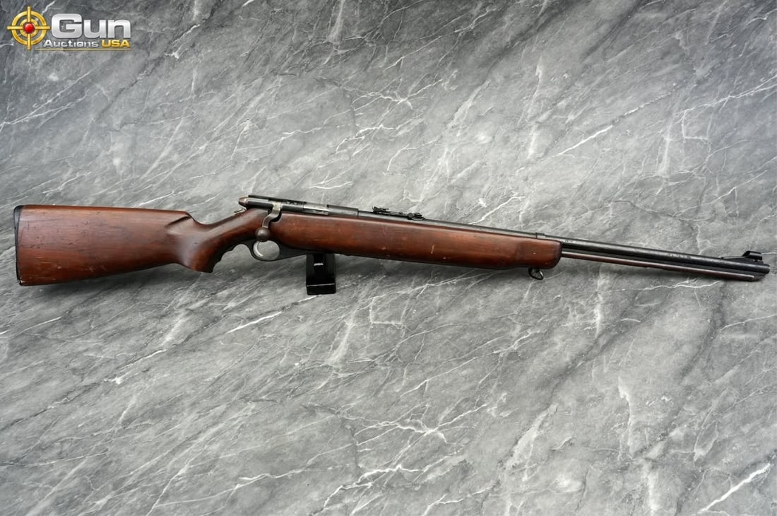 WESTERN FIELD 14M .22 BOLT RIFLE: WESTERN FIELD 14M 491A .22 S-L-LR Bolt Action Rifle, 26" Barrel, Good Condition, Normal Handling Marks, Shiny Bore, Tight Action, sn:NSNThis .22 S-L-LR bolt-action rifle features a hardwood stock with