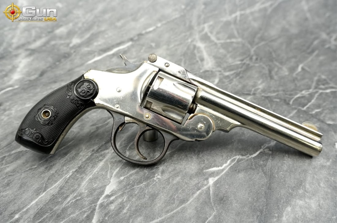 IVER JOHNSON .38 TOP BREAK REVOLVER: IVER JOHNSON TOP BREAK .38 Cal. Revolver, 4" Barrel, Very Good Condition, Shiny Bore, Tight Action, sn:76480This Iver Johnson top-break revolver in .38 caliber wears a bright nickel-plated finish thro