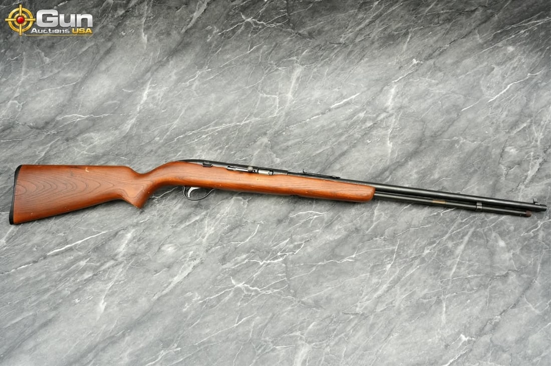 SEARS 25 .22 SEMI AUTO RIFLE: SEARS 25 .22 S-L-LR Semi Auto Rifle, 22" Barrel, Very Good Condition, Shiny Bore, Tight Action, sn:5832501This rimfire rifle features a one-piece hardwood stock with attractive figure and a blued