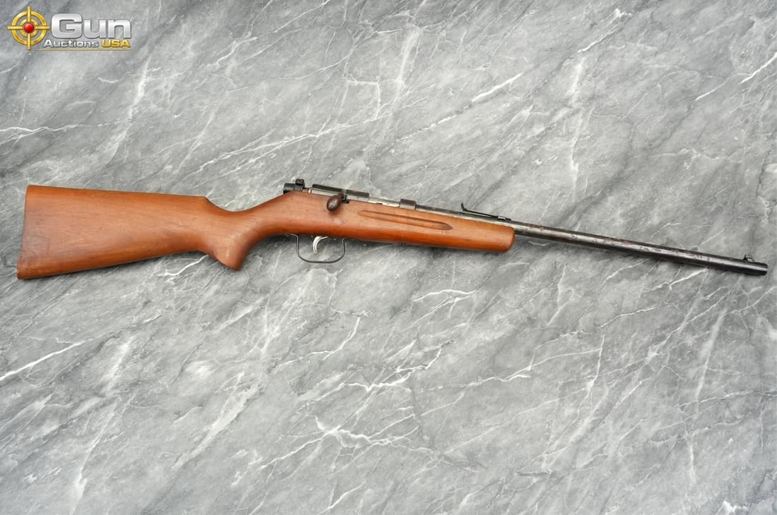 EIG 4 .22 BOLT ACTION RIFLE: EIG 4 .22 CAL Bolt Action Rifle, 18" Barrel, Good Condition, Normal Handling Marks, Shiny Bore, Tight Action, sn:NSNThis EIG Model 4 is a .22-caliber bolt-action rifle built on a hardwood stock with a