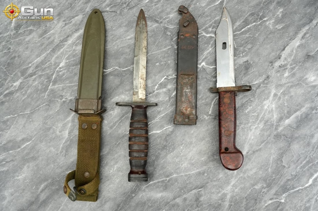 U.S. M4 Bayonet and Soviet AK-47 Type 1 Bayonet. F: U.S. M4 bayonet and Soviet AK-47 Type 1 bayonet. Fair Condition.This pairing includes a WWII/Korean War-era U.S. M4 bayonet with a stacked leather washer handle, shown with its olive drab M8A1