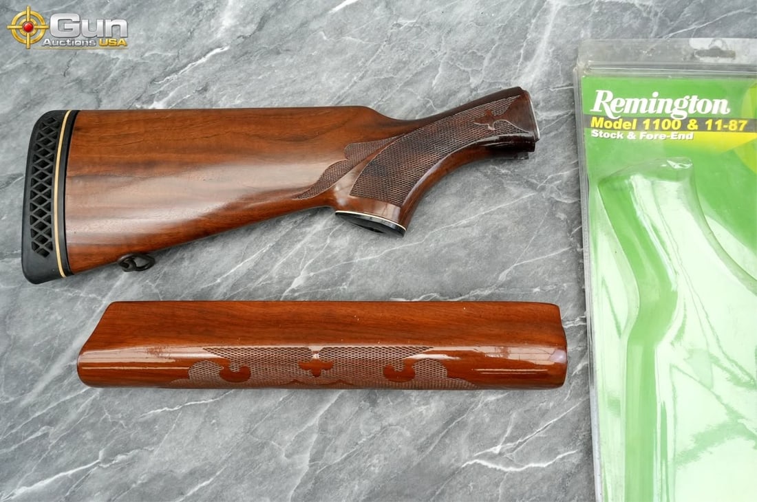 Remington 1100/11-87 stock & fore-end set. Very Go: Remington 1100/11-87 stock & fore-end set. Very Good Condition.A factory Remington walnut buttstock and fore-end set designed for 12 gauge Remington Model 1100 and Model 11-87 semi-automatic