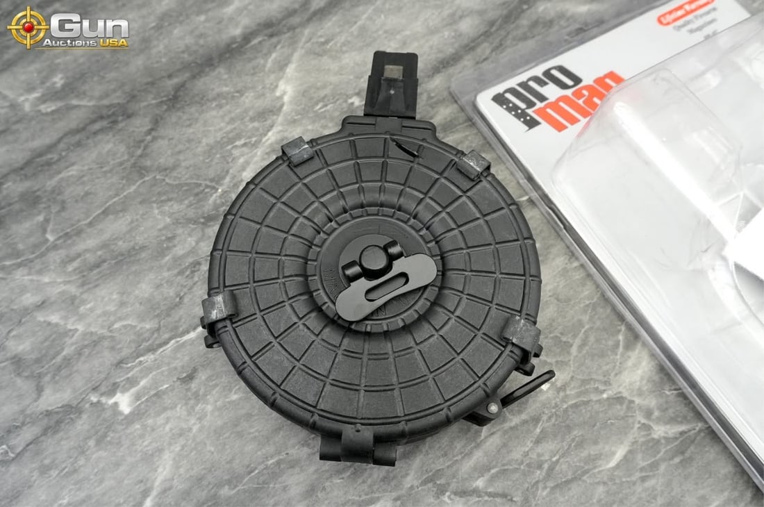 ProMag AK-47 drum magazine. Very Good condition. P: ProMag AK-47 drum magazine. Very Good Condition.This ProMag AK-47 73-round black polymer drum magazine, Model AK-A16, is chambered in 7.62x39mm and comes complete with its loading-instructions sheet i