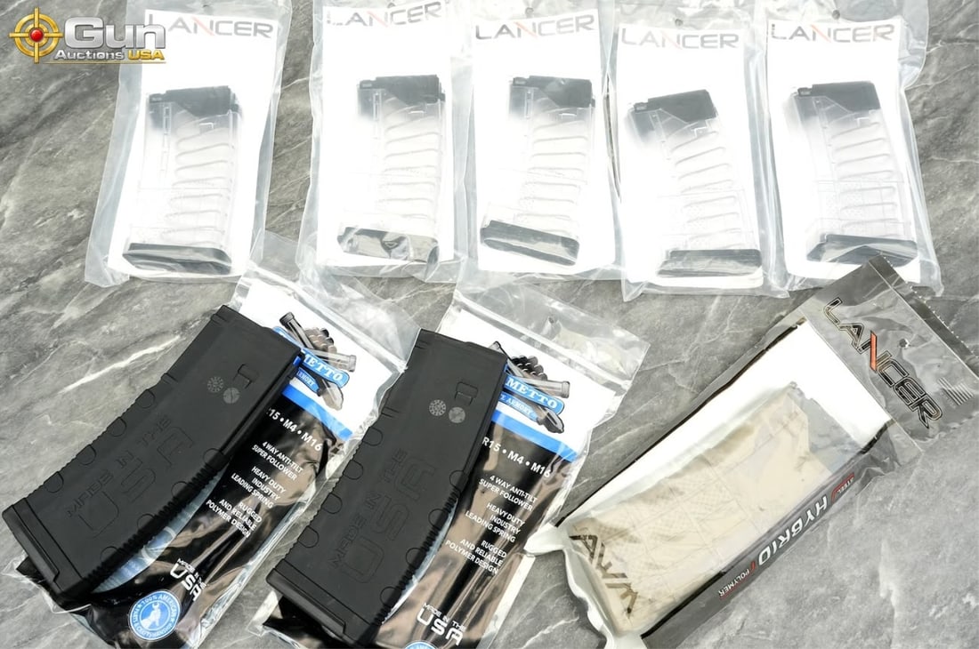 Lancer and Palmetto State Armory AR-15 magazines.: Lancer and Palmetto State Armory AR-15 magazines. New in packaging.This lot includes eight magazines: five Lancer L5AWM 20-round translucent (clear) magazines, one Lancer L5AWM30 30-round opaque Flat 
