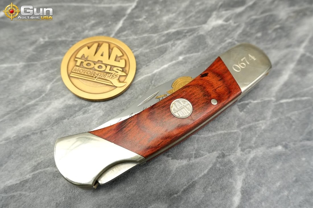 Three assorted commemorative folding pocket knives - 7